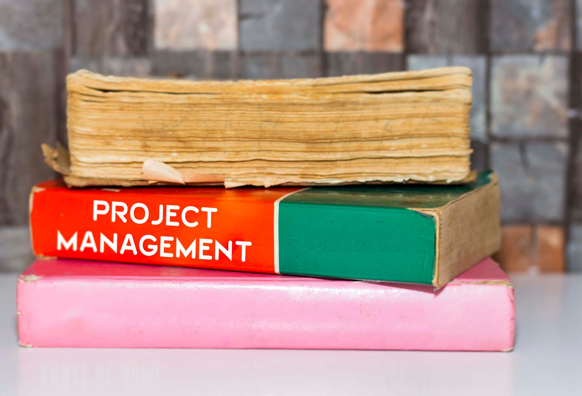 Project Management - Business Book Title on wooden white table